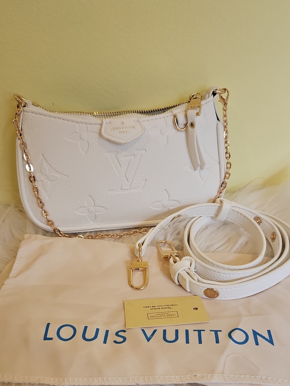 White Embossed Mini Pochette with Gold Hardware Gorgoues Brand New With Dust Bag